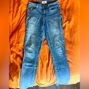 Skyline Mid Rise Faded Skinny Jeans